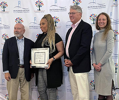 Sade receiving her certificate